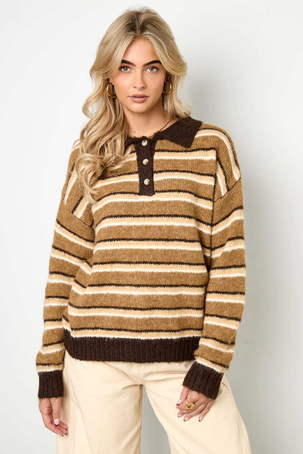 Knitted polo sweater with stripes